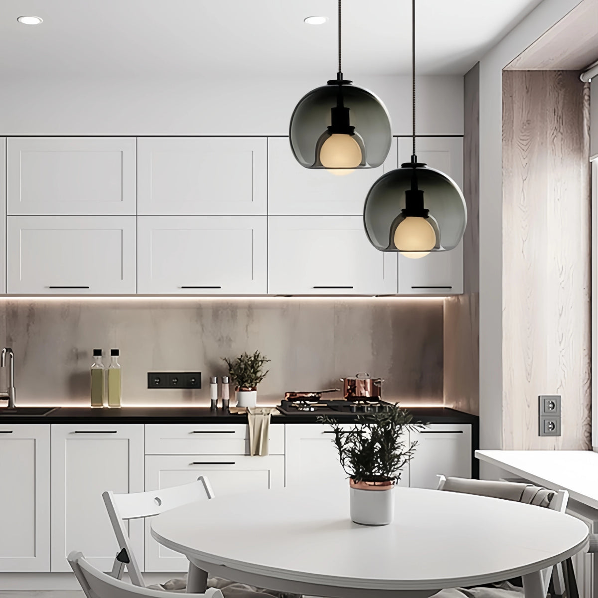 Orbis pendant light with Nordic-inspired glass design casting warm ambient glow for modern interiors