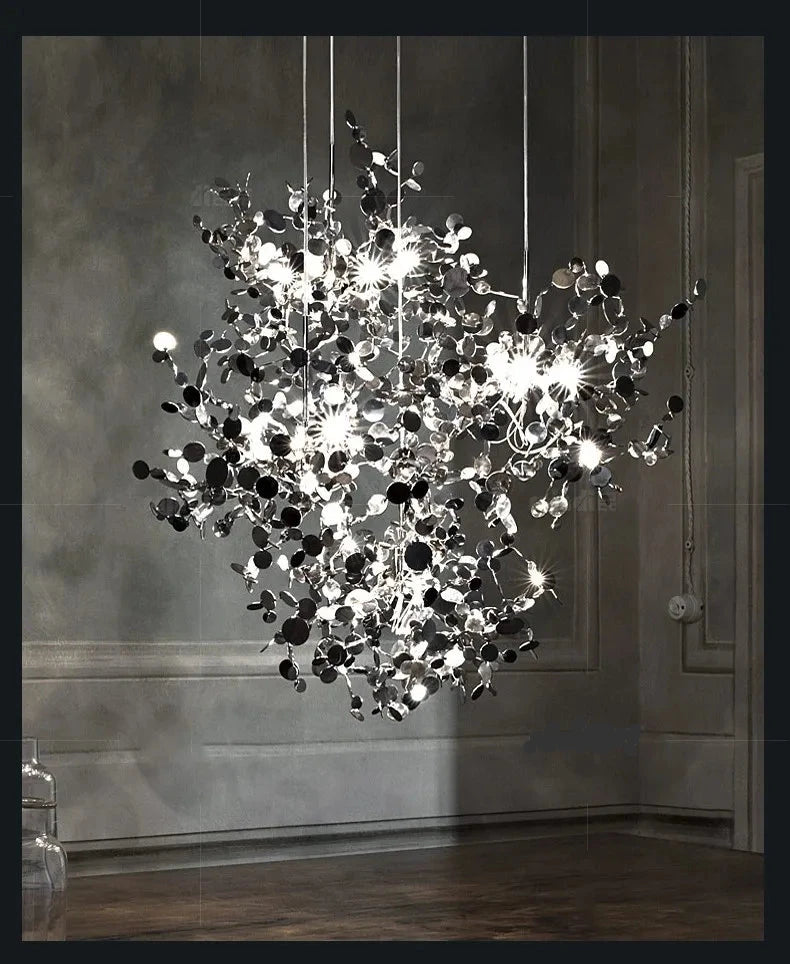 High-quality stainless steel Aurora chandelier with G9 light sources, available in Golden and Chrome finishes. Perfect for living rooms, dining rooms, bedrooms, villas, and lobbies, this versatile design blends luxury and functionality for a brilliant and inviting ambiance.