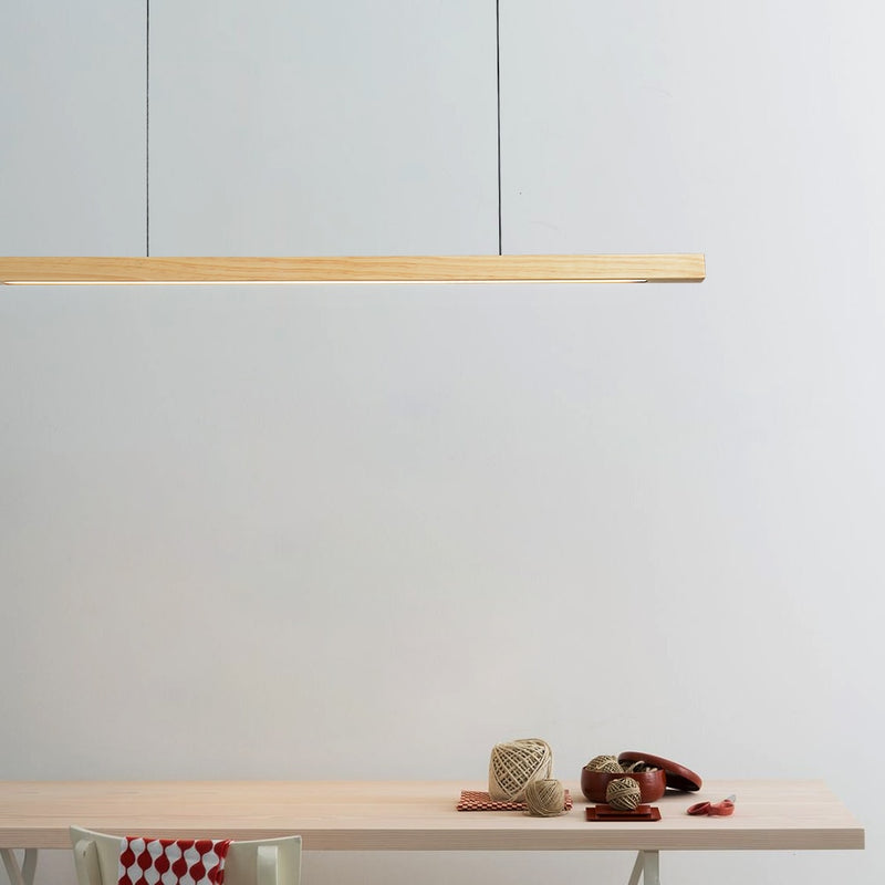 Lights of Scandinavia - Lindö - Modern long hanging dining room pendant light ala Nordic style. Will also make a good fit for office areas, restaurants and bars. Pine wood or black walnut Use the included remote to change color temperature between cold, neutral and warm light.