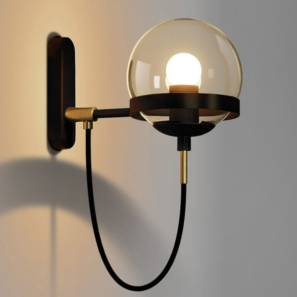 Lights of Scandinavia - Höskulle - Illuminate your home with the perfect blend of modern and postmodern style. Höskulle's wall-mounted E27 fixture is perfect for bedrooms, hallways, and even your conservatory! Crafted from iron, this sconce not only looks great but is also designed to last